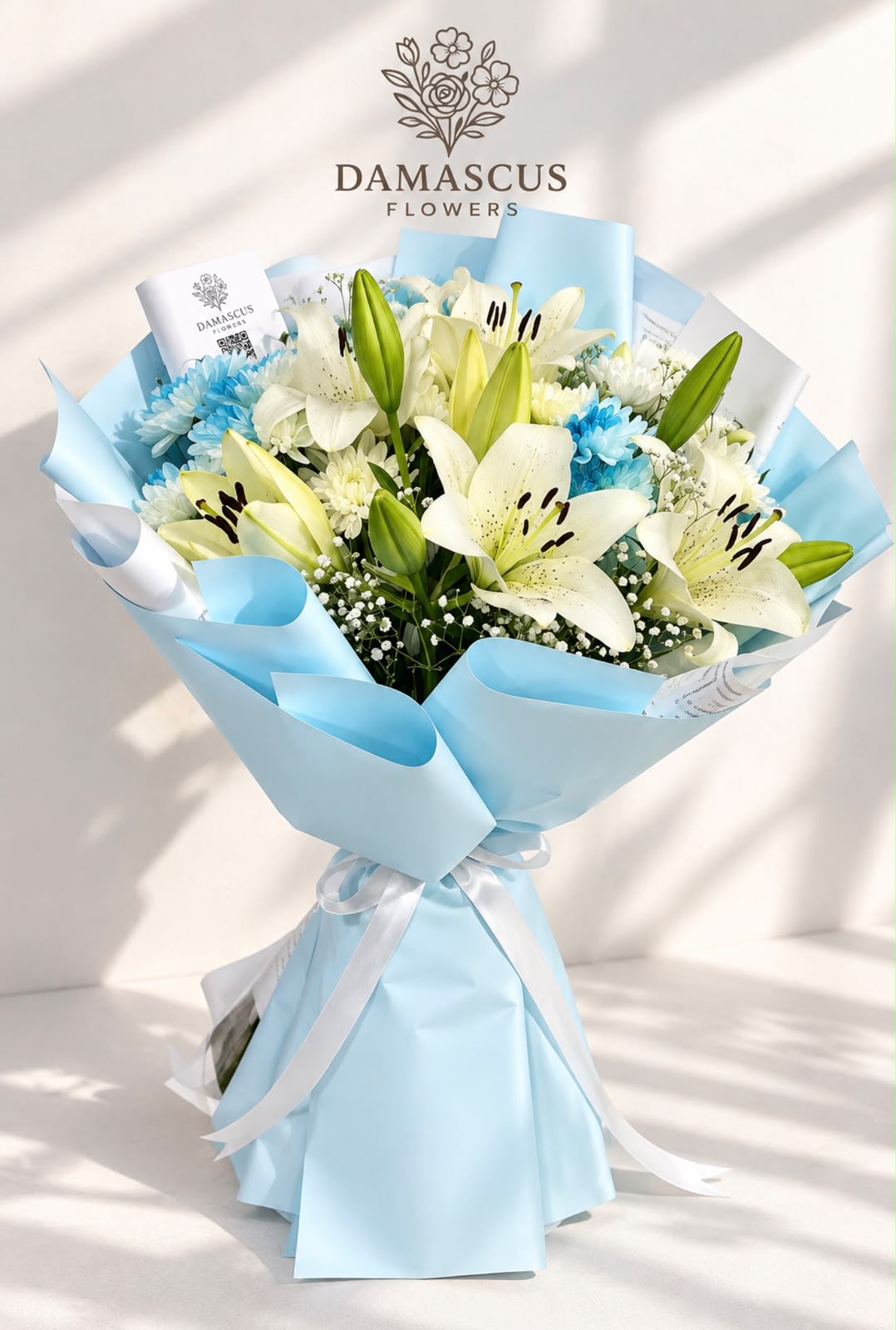 تفاصيل باقة المولود boy — ليليوم وكريزانثيم أزرق — Damascus Flowers