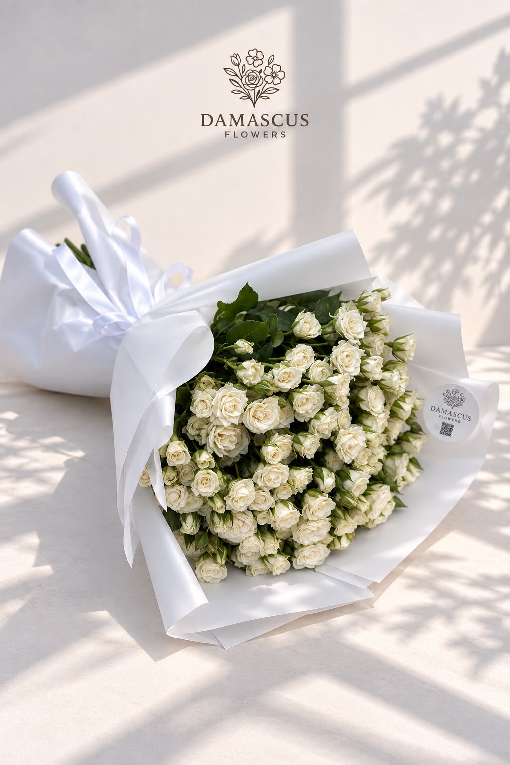 تفاصيل باقة البيبي روز الأبيض — Damascus Flowers